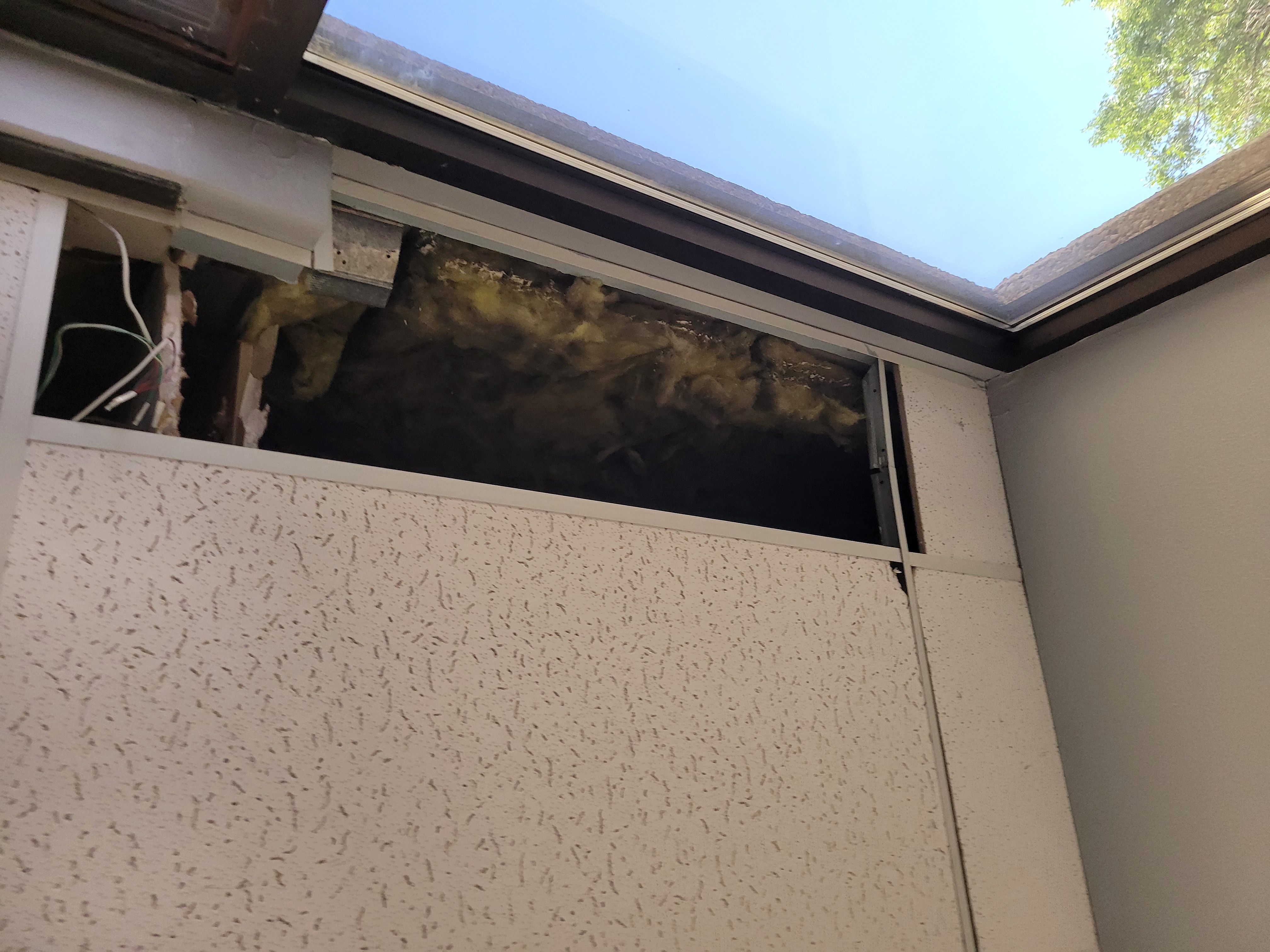 View of open ceiling with no panel.